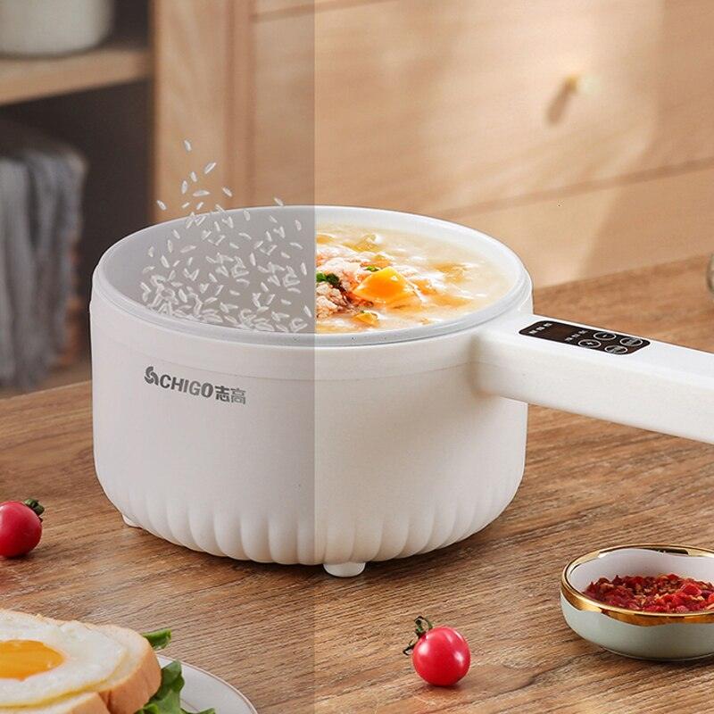 Panela elétrica multifuncional com regulador de tempo e temperatura.